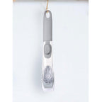 Liquid dispensing dish brush